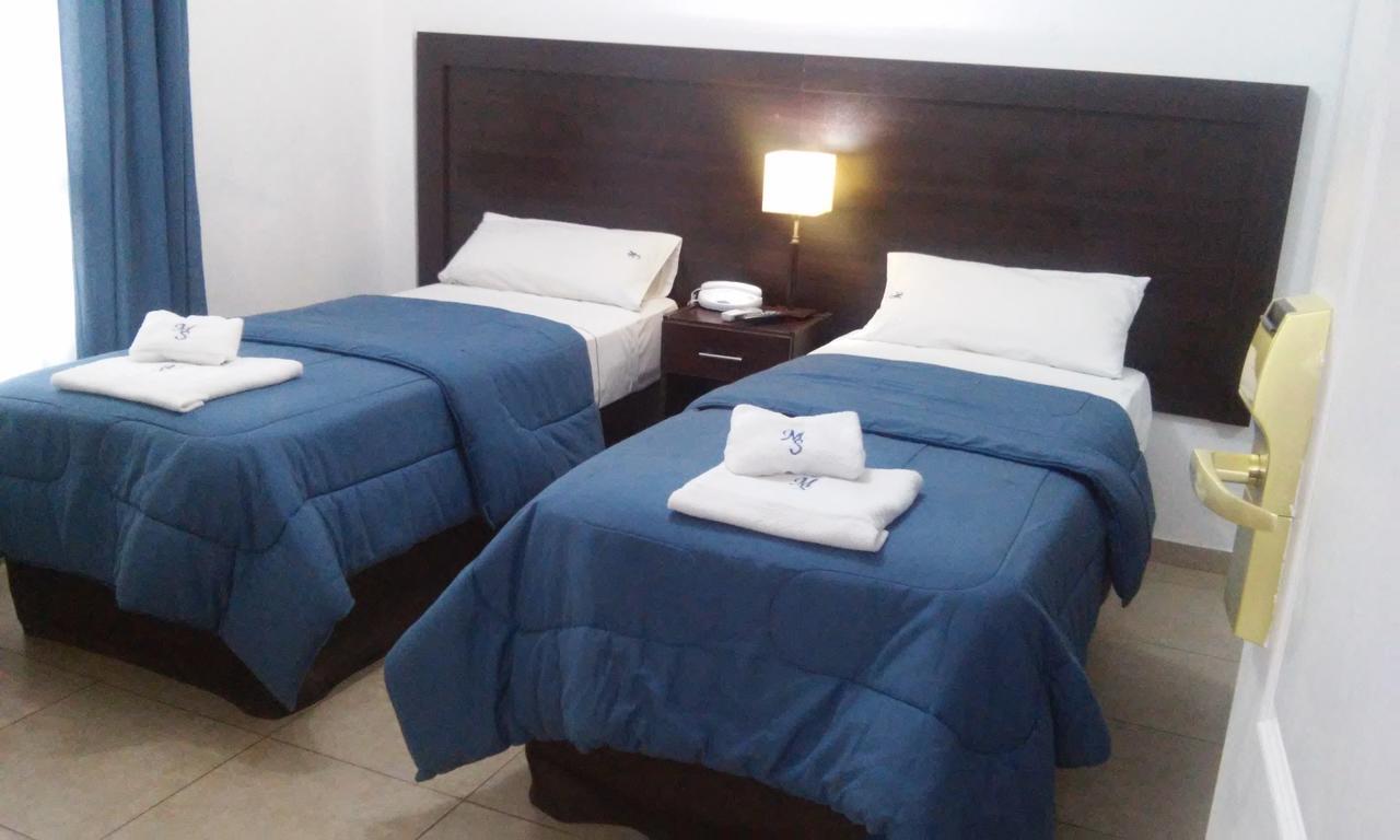 Morada Suites Campana Εξωτερικό φωτογραφία